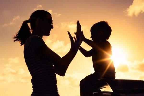 Image of happy mother and child after resolving child arrangements Horsham